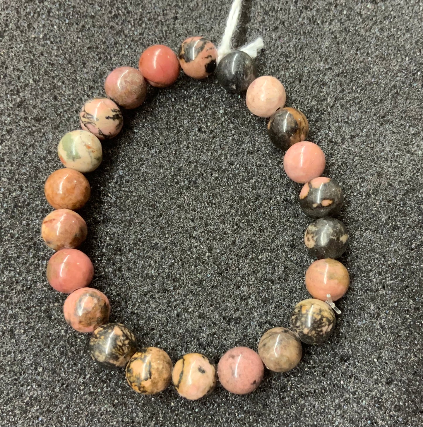 Bracelet en rhodonite perles 8 mm, avec ou sans breloques