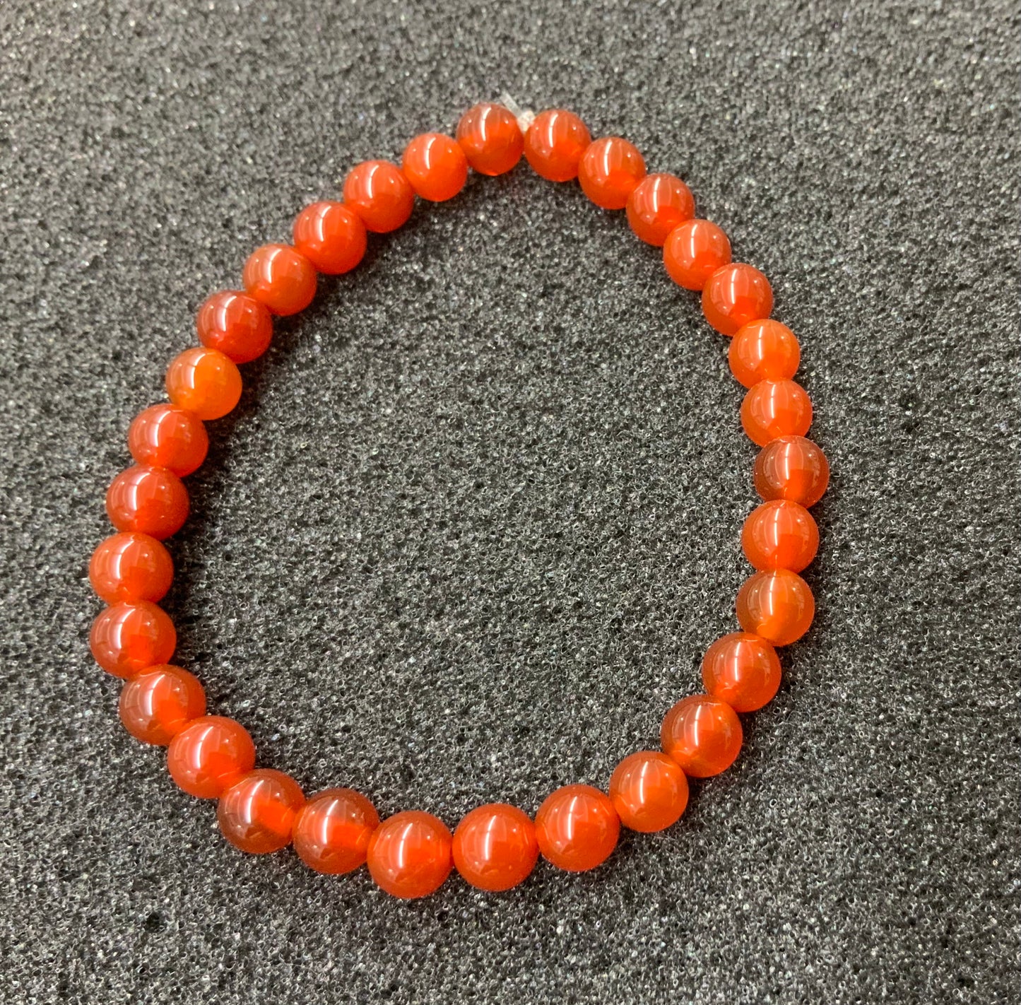 Bracelet en cornaline unie perles de 8mm