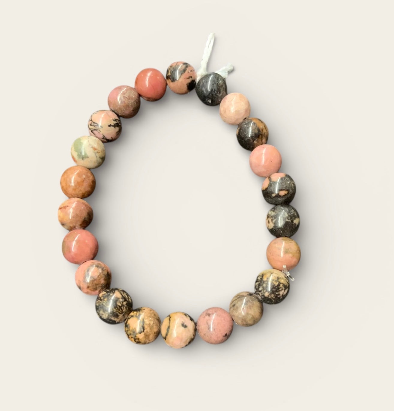 Bracelet en rhodonite perles 8 mm, avec ou sans breloques